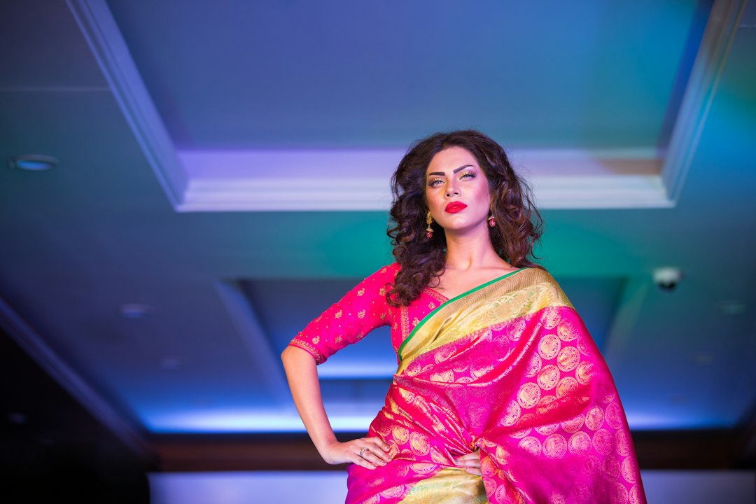 Woman posing in a silk saree for an Instagram photo